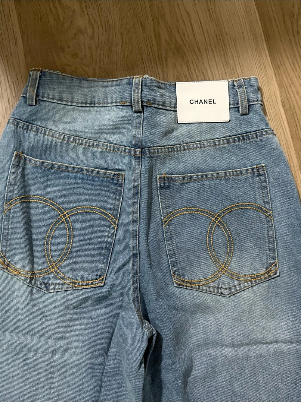 CHANEL Light Wash Wide-Leg Flared Jeans